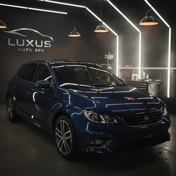 Polished city hatch catching soft lamp reflections