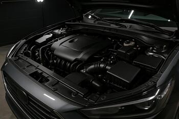 Engine bay after detail with satin plastics