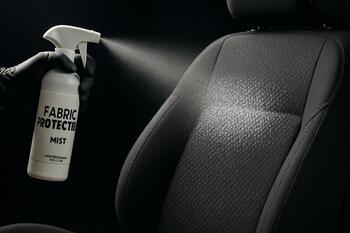 Fabric protection mist forming micro barrier on seats