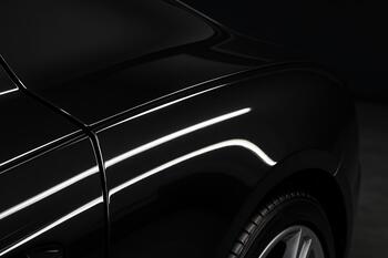 After correction with crisp lines and deep mirror gloss