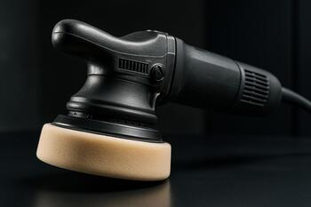 Dual-action polisher prepared with finishing pad